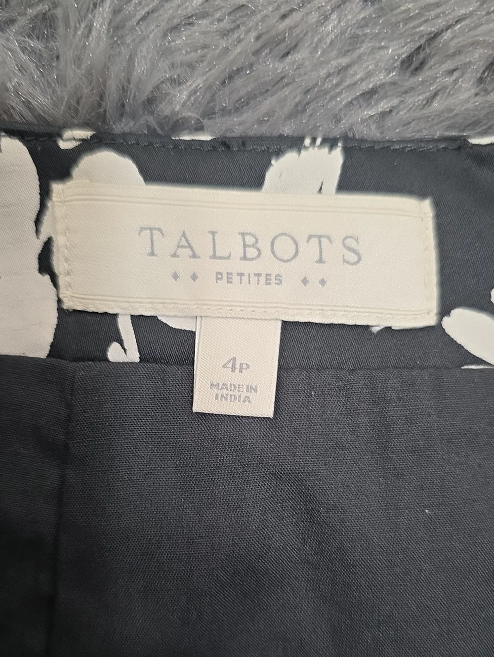 Talbots- Black Mini Skirt with White Floral Print. Size 4P. EUC